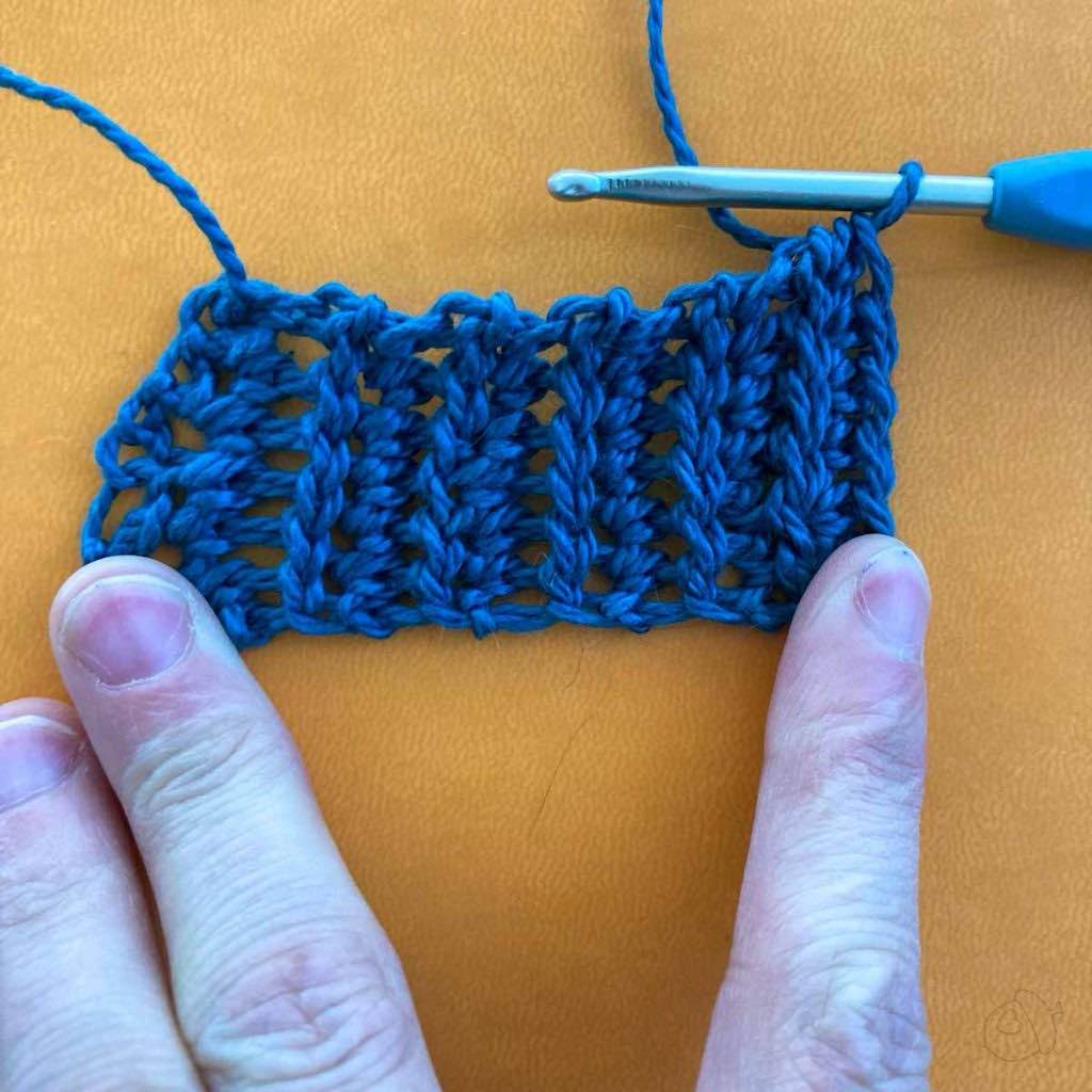 Swatch in progress shown stretched