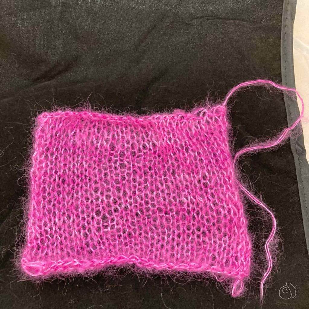 unblocked pink swatch on black background. 