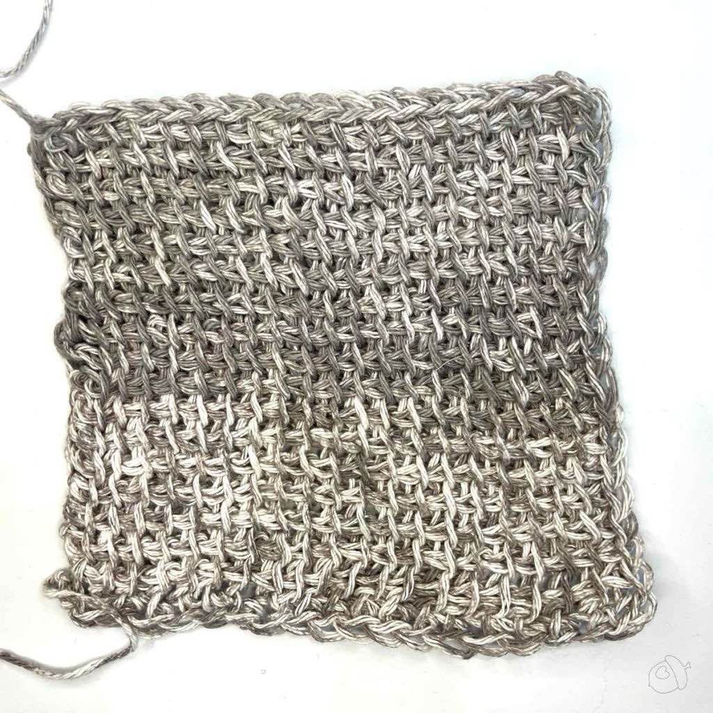 unblocked swatch on white surface. TSS in Premier Home, worked on 6.5mm hook